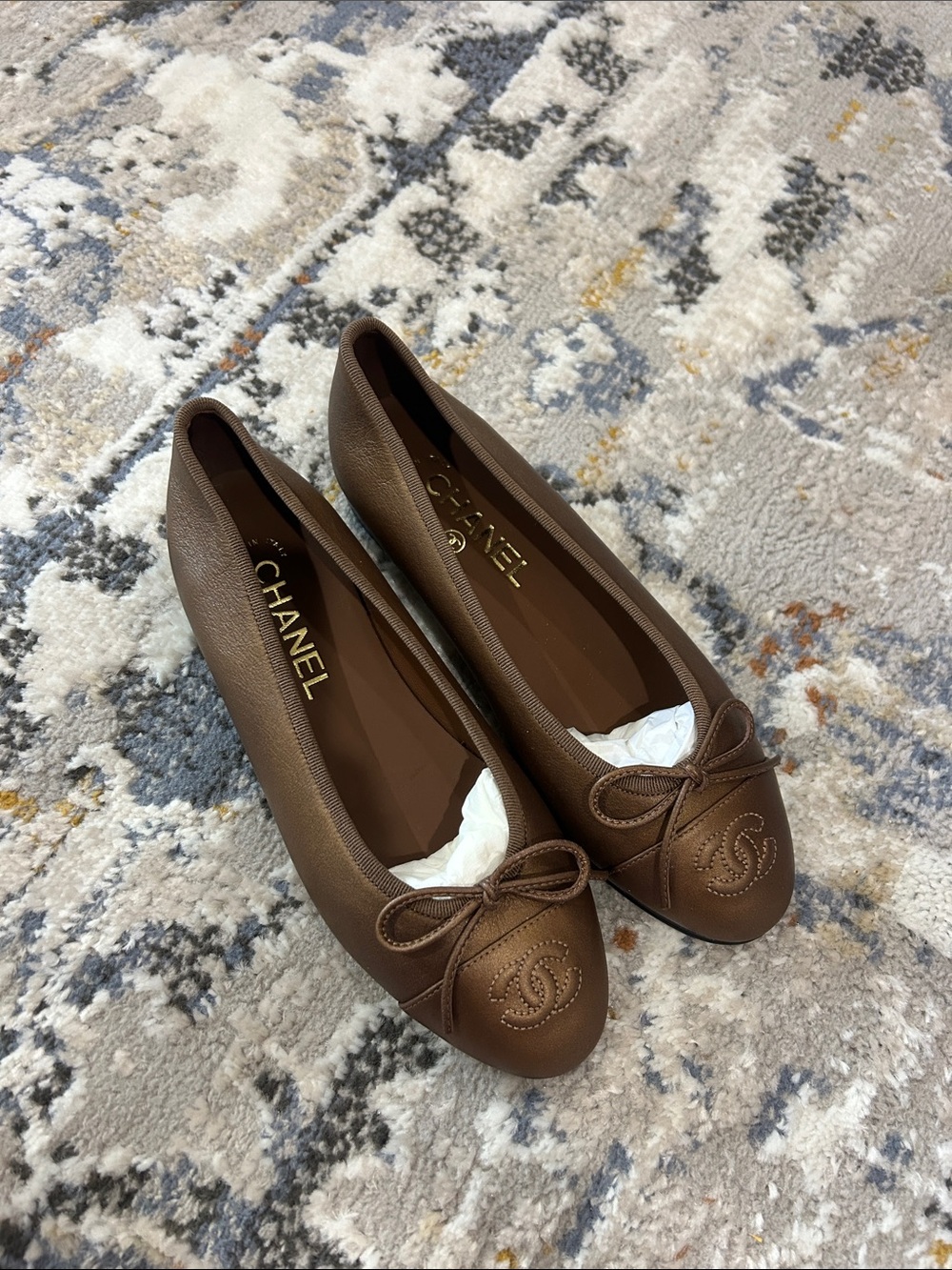 CHANEL Brown Leather Cap-Toe Ballet Flats with CC Bow